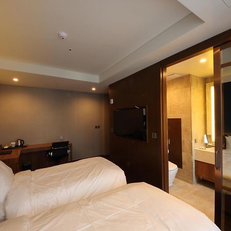 Benikea The H Hotel Hwaseong Habitación foto