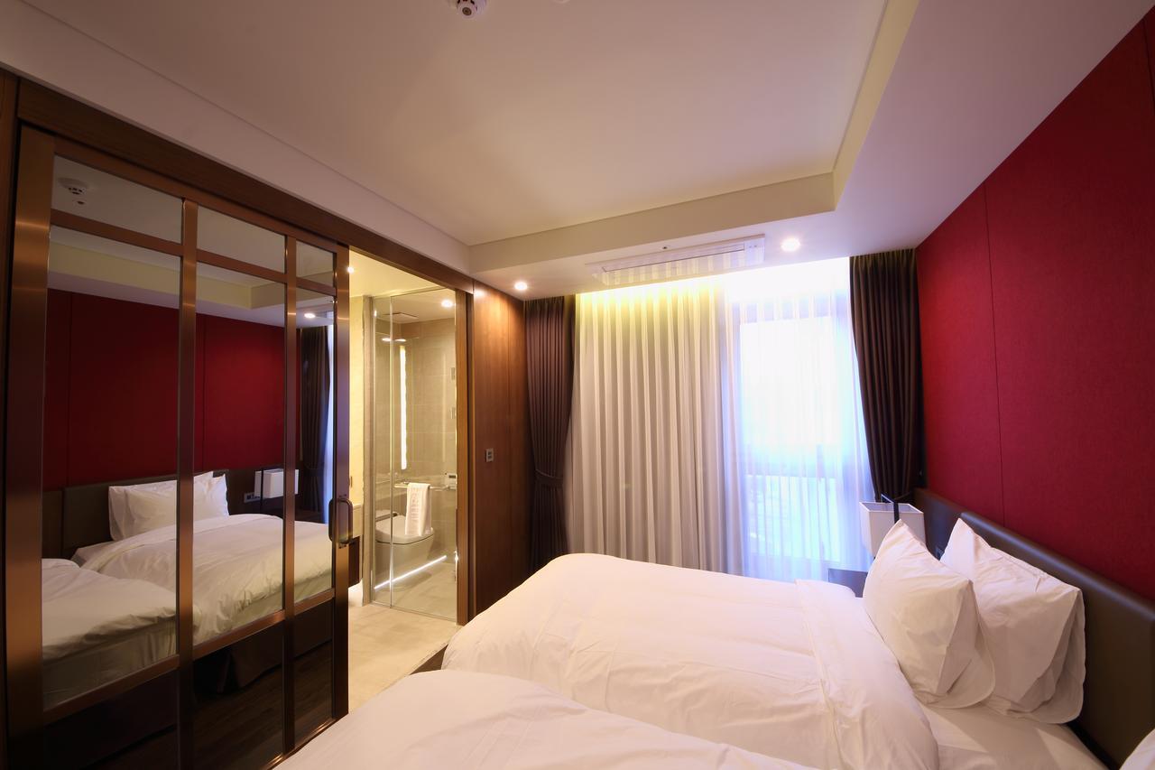 Benikea The H Hotel Hwaseong Habitación foto