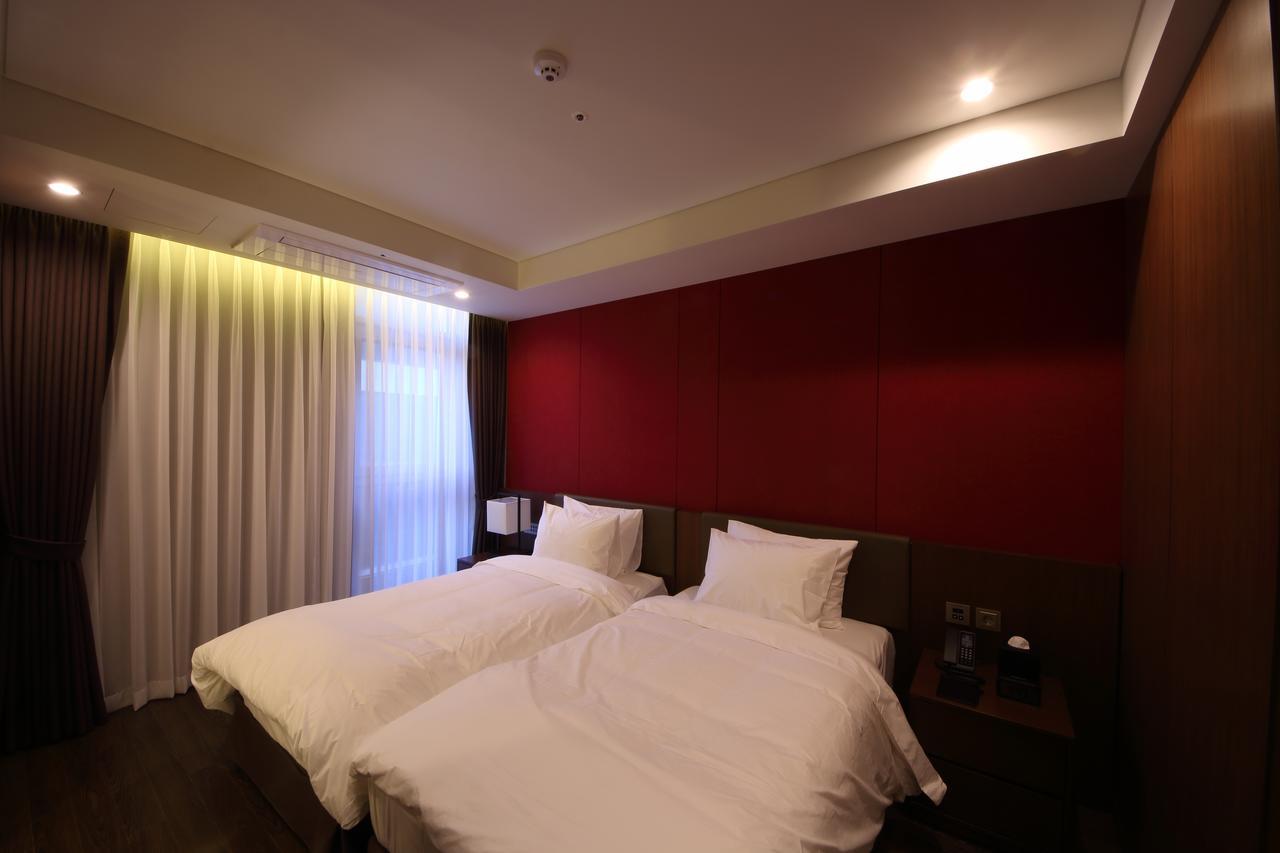 Benikea The H Hotel Hwaseong Habitación foto